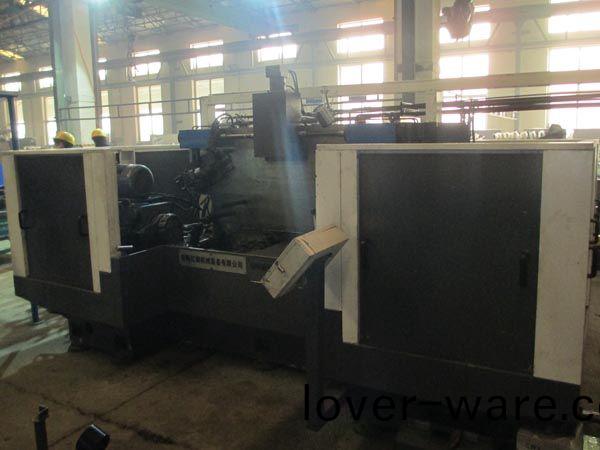 扭(niu)力樑雙(shuang)麵(mian)銑(xian)削組(zu)郃(he)機(ji)牀